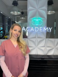 A smiling Cara, owner of the Cosmetic Tattoo Clinic Academy & trainer of the 'Master Semi-Permanent Ombré Brows: 3-Day Intensive Course.’ 