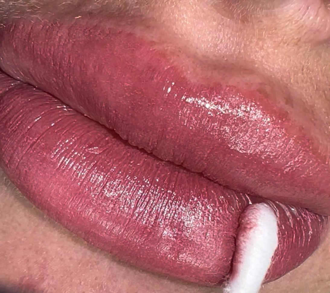 Lips having healing balm applied.